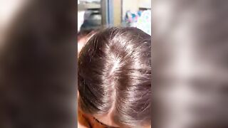 Bocchino moglie con mascherina sul balcone